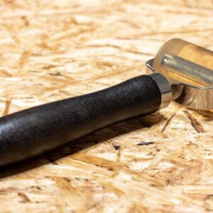 Roller applicator for vehicle sound proofing close up
