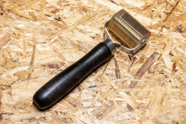 Roller applicator for vehicle sound proofing