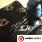 Dead Mat van soundproofing roll being cut with scissors
