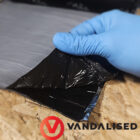 Dead Mat van soundproofing showing peel backed adhesive layer